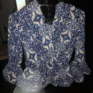 Beautiful blue floral Akira top!
